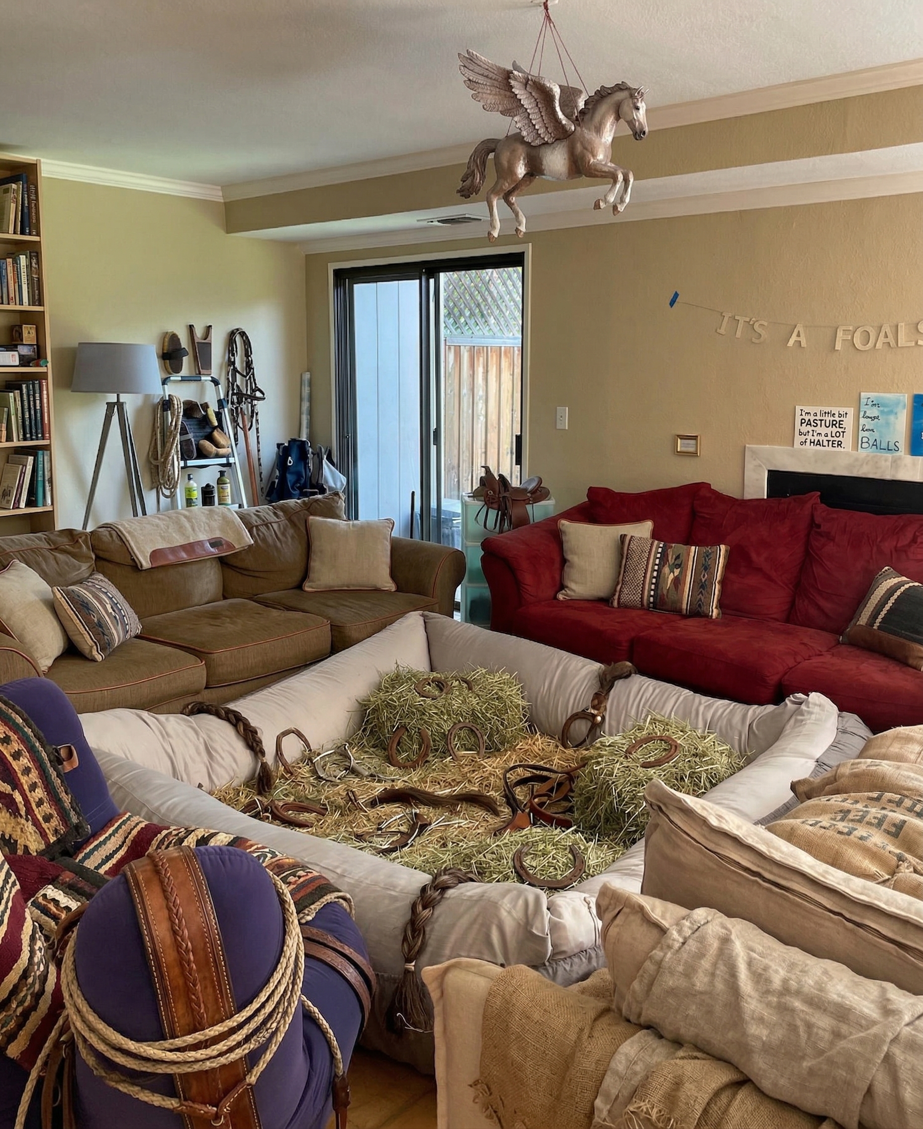 The Paddock art installation with hay bales and horse blankets